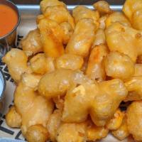 Fried Cheese Curds · Watonga cheese curds beer-battered and fried with a side of house tomato soup (mule marinara...