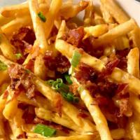 Bacon Cheese Fries · Fries covered in a house-made cheese sauce and sprinkled with bacon and green onions.