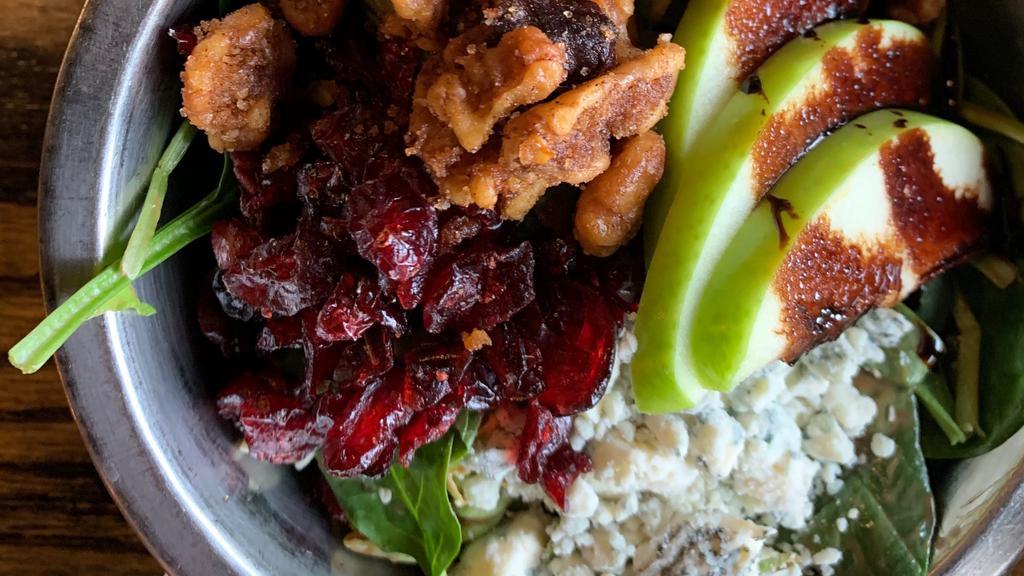 Spinach Salad · Fresh spinach, bibb lettuce, blue cheese crumbles, apples, spiced walnuts, dried cranberries, balsamic vinaigrette.