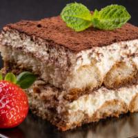 Tiramisu · Classic Italian dish featuring espresso soaked lady fingers with a layer of mascarpone and a...