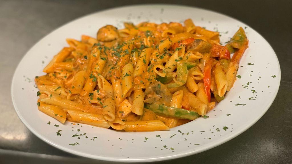 Pasta Juli · Chicken, broccoli, peppers, mushroom, onion, spinach penne, tossed with made to order palomino sauce.