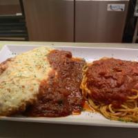 Chicken Parmigiana · Oven baked with Romano, mozzarella cheese and tomato sauce. Served with spaghetti.