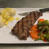 New Size: 10 Oz. Prime New York Strip Steak · PLEASE READ: 
 our 10 oz. New York strip steak.  served with vegetables and choice of potato