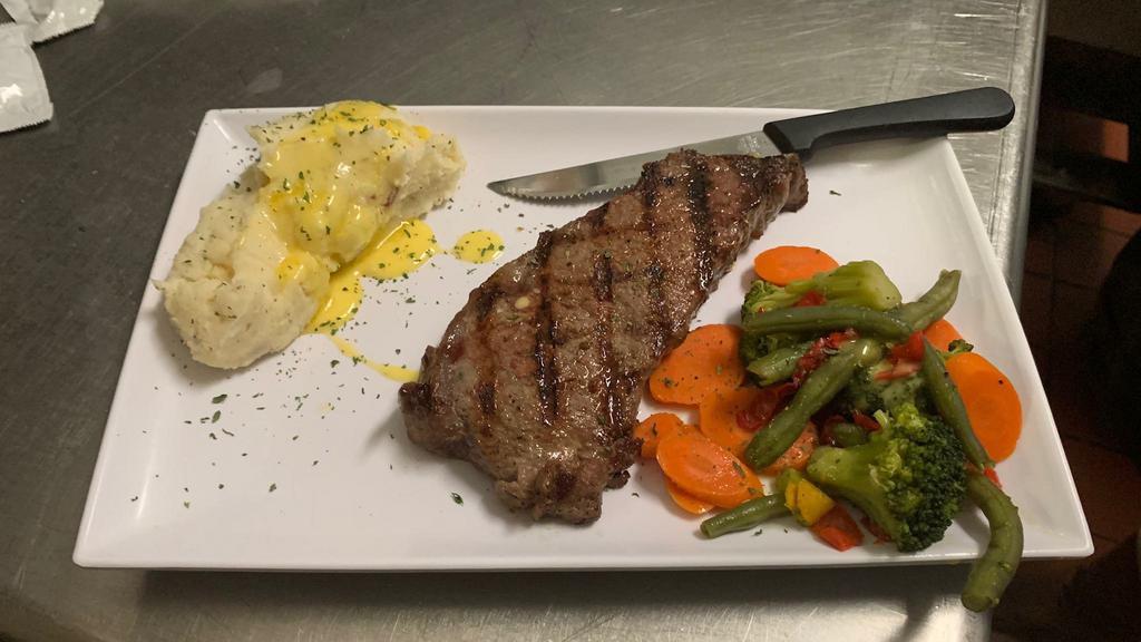 New Size: 10 Oz. Prime New York Strip Steak · PLEASE READ: 
 our 10 oz. New York strip steak.  served with vegetables and choice of potato