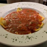 Ravioli · Ravioli filled with choice of meat or ricotta and Romano. If it's a tough decision, make it ...