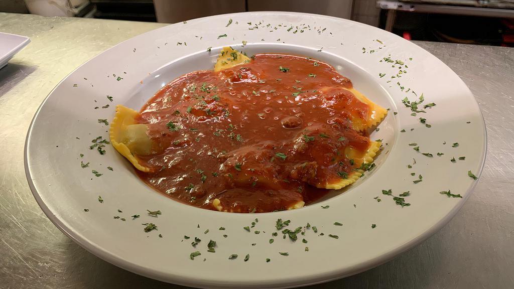 Ravioli · Ravioli filled with choice of meat or ricotta and Romano. If it's a tough decision, make it a combination of both.