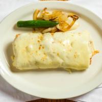Camino Real Burrito · A 12” flour tortilla filled with your choice of meat, fresh guacamole, refried beans, sour c...