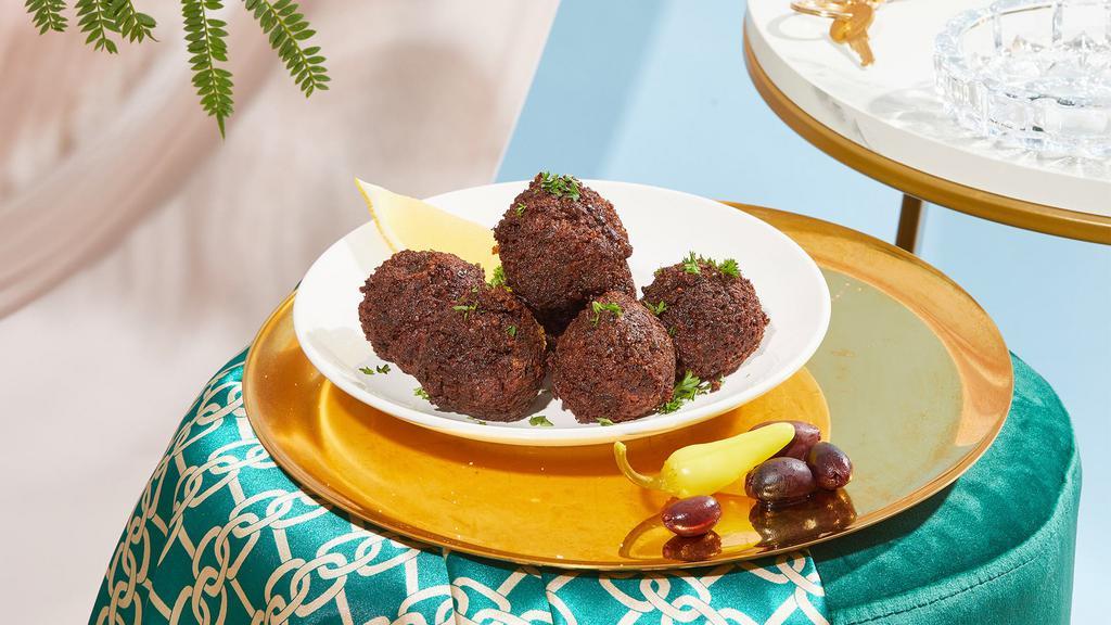 Falafel (6Pc) · Crispy fried falafel made of chickpeas and herbs.