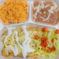Enchiladas Suizas · 4 Enchiladas suizas stuffed with cheese, chicken, or beef. Covered in salsa & more cheese ga...