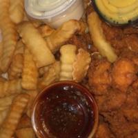 Chicken Strips · Hand cut and breaded Chicken tenders with fries and your choice of dipping sauce.