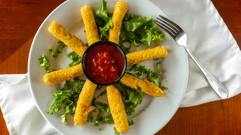 Cheese Sticks · Mozzarella sticks breaded and deep fried with a side of marinara.