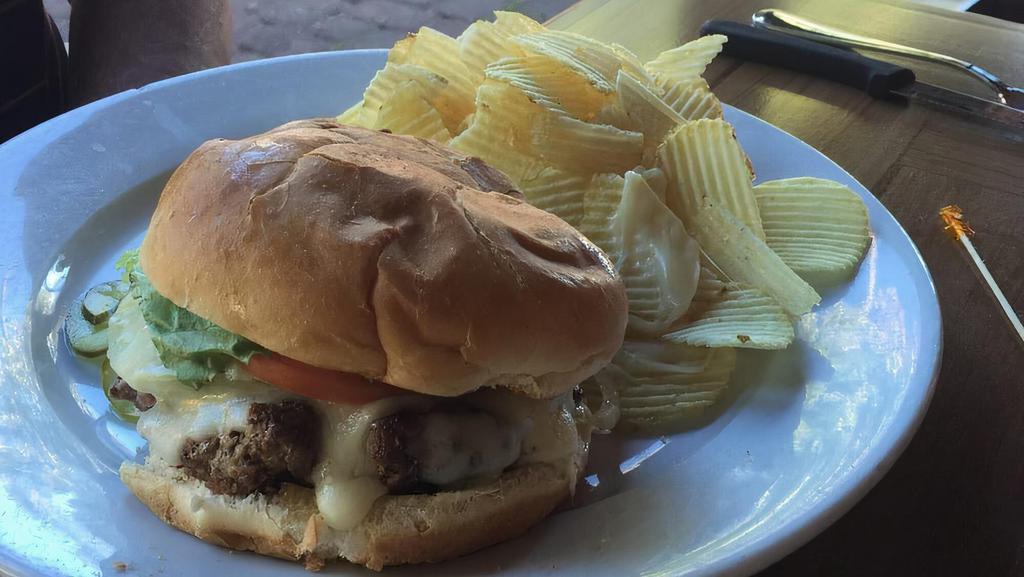 Bobcat Burger · Dressed with caramelized mushrooms and onion, topped with Swiss cheese, lettuce and tomato.
