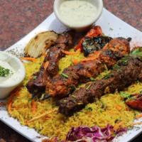 Kofta Kebab Platter · two  square of marinated  lamb and beef, mixed with parsley, onion,  , grilled veggie (onion...