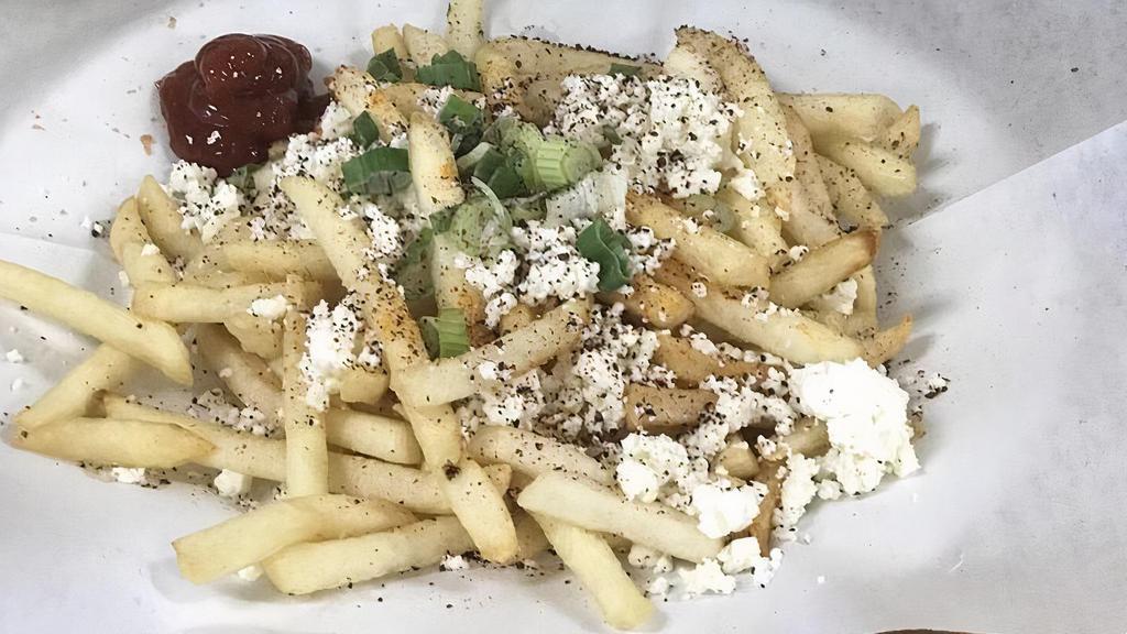 Feta Fries · Fries topped with feta cheese and green onions.