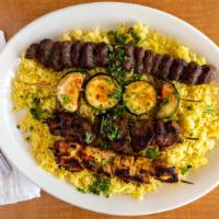 Mixed Grilled Kabob · For all of you, meat lovers your choice of three skewers of chicken, kofta, or lamb served w...