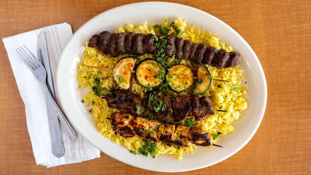 Mixed Grilled Kabob · For all of you, meat lovers your choice of three skewers of chicken, kofta, or lamb served with grilled vegetables.