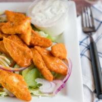 Buffalo Chicken Salad · Crispy chicken strips tossed with our buffalo sauce over romaine with cucumber, celery, carr...