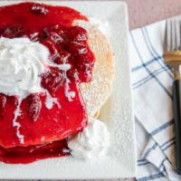 Strawberry Pancakes · Served with butter, syrup and powdered sugar.
