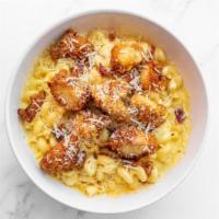Mavericks Mac & Cheese · Cavatappi pasta tossed in our five cheese sauce, topped with roasted chicken and apple-wood ...