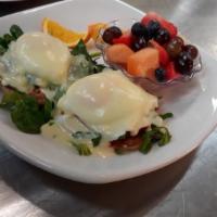 Florentine Benedict · Poached fresh eggs, Canadian bacon, toasted English muffin, and an authentic Hollandaise sau...
