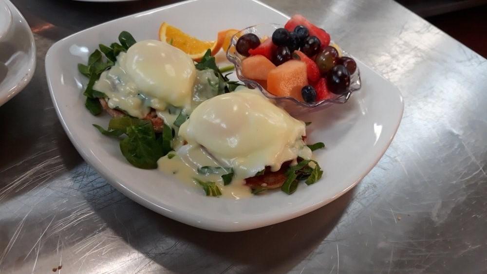 Florentine Benedict · Poached fresh eggs, Canadian bacon, toasted English muffin, and an authentic Hollandaise sauce.