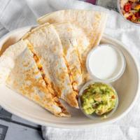 Quesadillas · Includes lettuce, tomatoes and sour cream on the side.