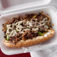 Philly Steak · Served With Grilled Onion Green Peppers and Swiss Cheese