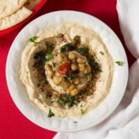 Hummus With Pita · Our Signature home made creamy hummus topped with drizzle of virgin olive oil. accompanied w...