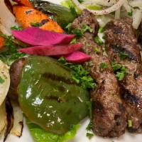 Shish Kafta · Charbroiled ground lamb with parsley, onions and spices