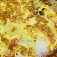 Mexican Omelette · With green peppers, onions, tomatoes and jalapeño peppers, chorizo sausage and monterey Jack...