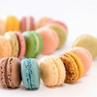 Macarons Box Of 24 · Regular white box of 24 macarons. Any flavor of your choice but 24 maximum. Add a footnote w...