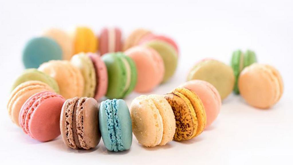 Macarons Box Of 24 · Regular white box of 24 macarons. Any flavor of your choice but 24 maximum. Add a footnote with the required additional flavors.