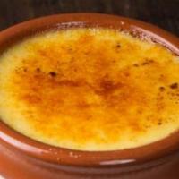 Creme Brûlée (Gluten Free) · Our creme brulee is a smooth custard, baked with Madagascar vanilla beans, and caramelized t...