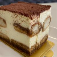 Tiramisu · Layers of espresso drenched ladyfingers separated by mascarpone cream and dusted with cocoa ...