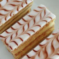 Napoleon · Made of very thin and flaky mille-feuille pastry, our Napoleon is layered with rich, French ...