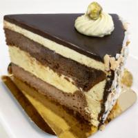 Torte | Pistachio Chocolate (Gluten Free, Slice) | New · Almond flour chocolate cake, pistachio mousse, pistachio buttercream and chocolate ganache. ...