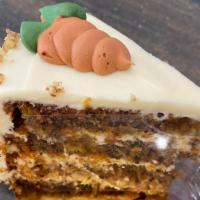 Carrot Cake (Slice) | New · Classic carrot cake with walnuts and cream cheese buttercream. Finished with an edible carro...