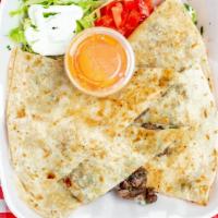 Quesadillas · Large tortilla filled with your choice of meat. Served with side of lettuce tomato and sour ...
