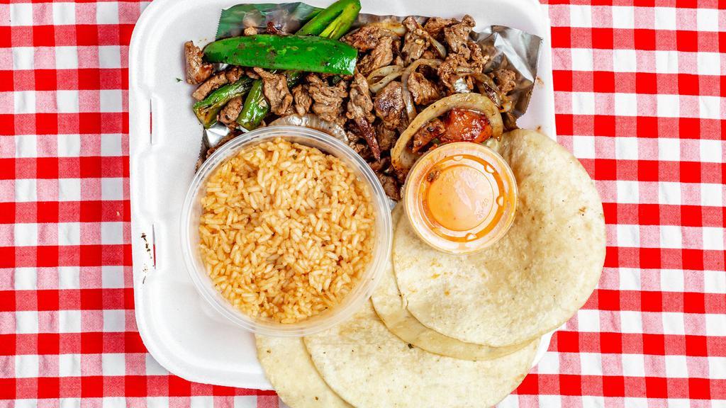 Fajitas · Your choice of meat served with fajita style peppers, onions and tomatoes.