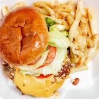 Cheeseburger And Side Of Fries · Lettuce, tomato, onion, American cheese, mayo, mustard and ketchup.