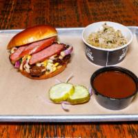 Signature Texas Beef Brisket Sandwich · Slow-slow-smoked beef brisket chopped on a toasted buttery bun.