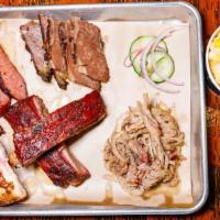 Southern Sampler · A sample of all our smokin' meats. Includes 1/4 chicken, 1/4 lb. brisket, 1/4 lb. pulled por...