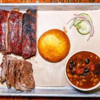 2 Meat Platter · Your choice of two different meats served with your choice of legendary side and a cornbread...