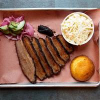 Brisket Platter · A Half Pound of Slow-smoked tender beef brisket served with your ‘choice of legendary side a...