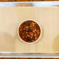 Jimmie Beans · Baked beans, peppers, brisket, pork, and hot links in a sweet and savory sauce.