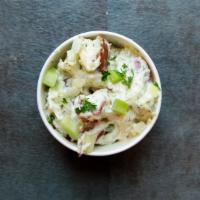 Dill Potato Salad · Baby skin on red potatoes, cubed, and tossed in a creamy dill dressing.