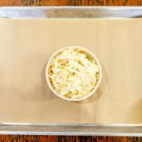 Creamy Coleslaw · Fresh green cabbage and carrots in a sweet and creamy dressing.