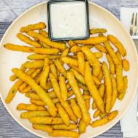 Green  Bean Fries · Breaded and Fried Green Beans. Your Choice of Sauce to Dip!