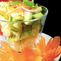 Cucumber Salad · Fresh sliced cucumber, carrots, and red onions with Thai sweet and sour dressing. Vegetarian.