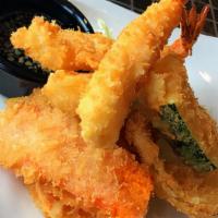Tempura Bento Combo · Shrimps and vegetable tempura, seaweed salad, California roll, three pieces of sushi, served...